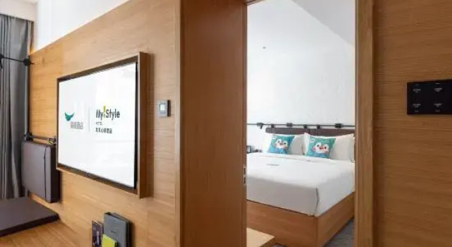 Семейный люкс с видом на город Hefeng Xinyi Hotel 和风心驿酒店劲松店