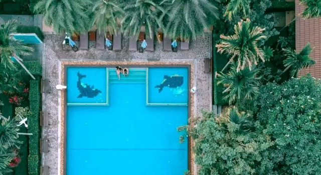 Кровать в общем номере Villa Wanida Garden Resort
