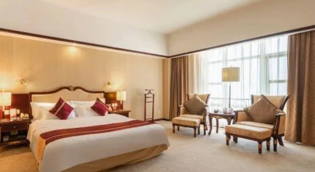 Номер Deluxe Mangshi Hotel