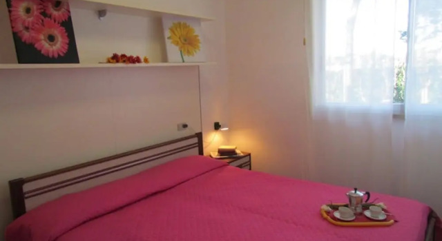Colorful Apartment With Patio, Забронировать Апартаменты/квартира Бибионе-Пинеда Венето, рядом с Долина Вальгранде