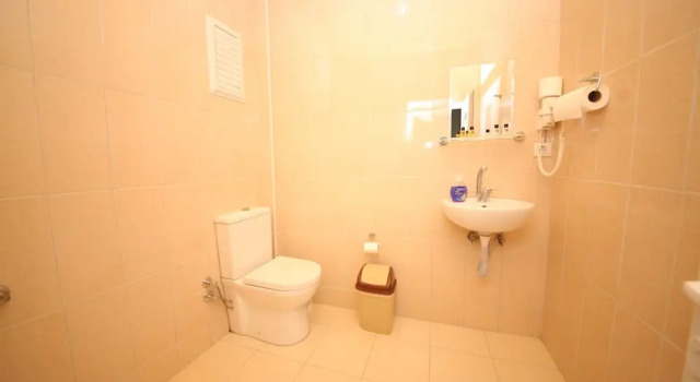 Кровать в общем номере с 6 комнатами Emiroğlu Konak Otel