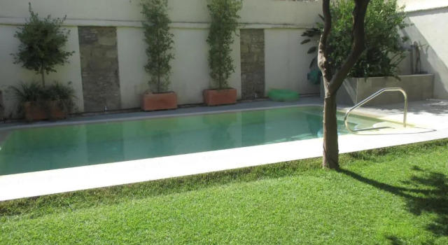 Апартаменты Deluxe Apartamento Bizcocheros con piscina y jardín privado