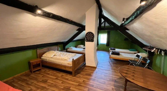 Кровать в общем номере Le Domaine De Malchamps