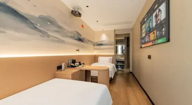 Кровать в общем номере Marriott Cloud House Hotel (Jingdezhen Ancient Kiln)