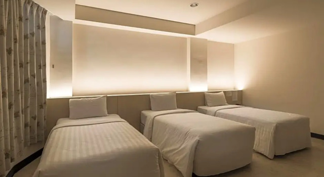 Номер Comfort Lotus Yuan Business Hotel