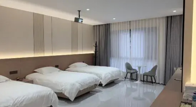 Mile Xinyuan Hotel, Prenota Hotel Miyang Yunnan