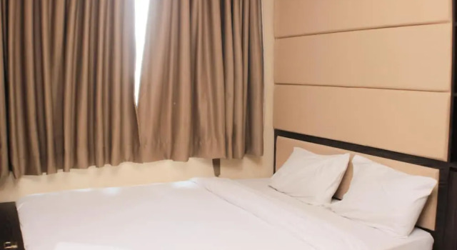 Апартаменты Nice and Comfort 1BR at Sky Terrace Apartment By Travelio
