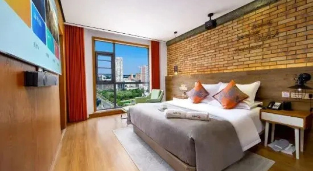 Шестиместный люкс Business Mango One Huayue Hotel