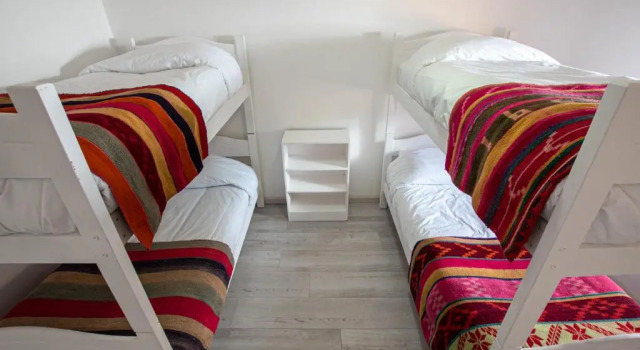 Кровать в общем номере Hostal Copart