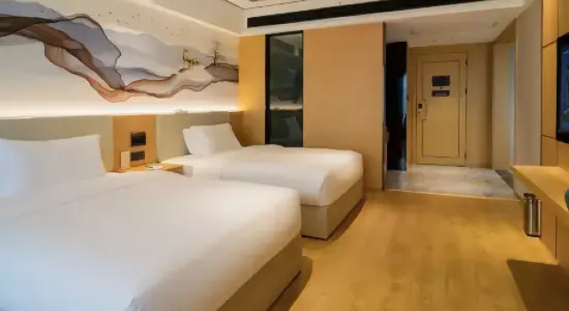 Четырёхместный люкс Yincheng Holiday Hotel