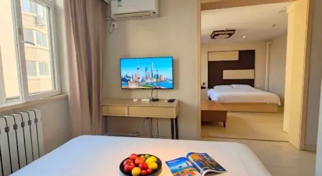 Полулюкс Qingdao Jinshancheng Business Hotel (Qingdao North Station Shuiqinggou Subway Station)
