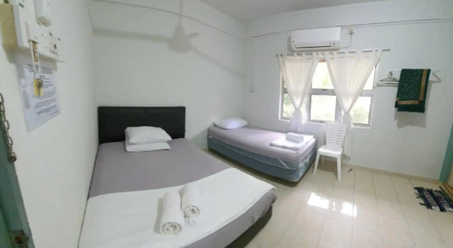 Номер Deluxe OYO 90116 Fbs Inn Hotel