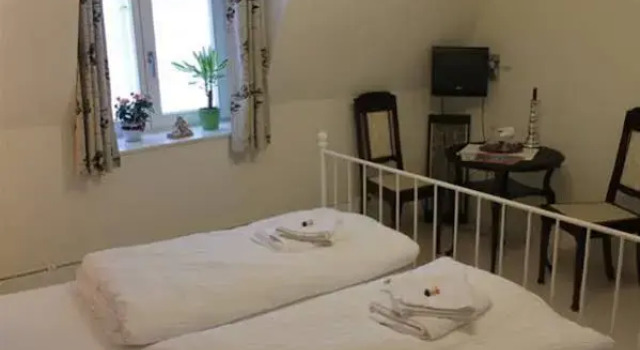 Ferienhaus Wiethüchter, Забронировать Отель Отели Любека с парковкой, рядом с Концертный зал и конгресс-центр Любека, Парковка