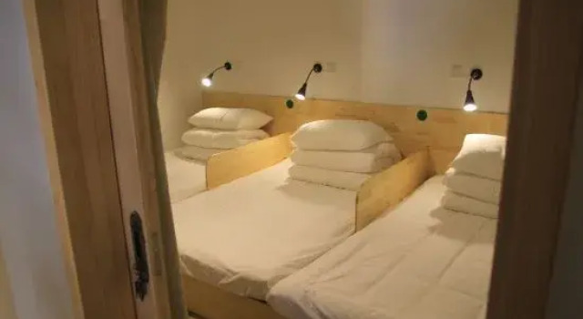 Кровать в общем номере Beijing Pagoda Light International Youth Hostel