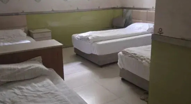 Кровать в общем номере (мужской номер) shanghai haiyan hotel