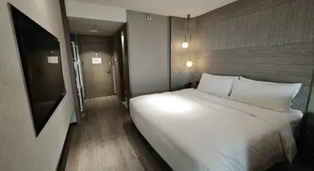 Люкс Kuanrong Suites Hotel (Liangjiang love sea shopping park)