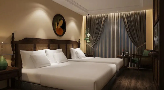 Трёхместный семейный номер Standard с балконом The Lotus Aman Hotel