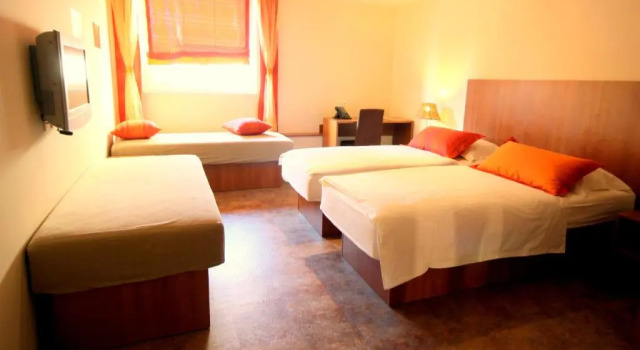 Четырёхместный номер Standard Ambient Hotel