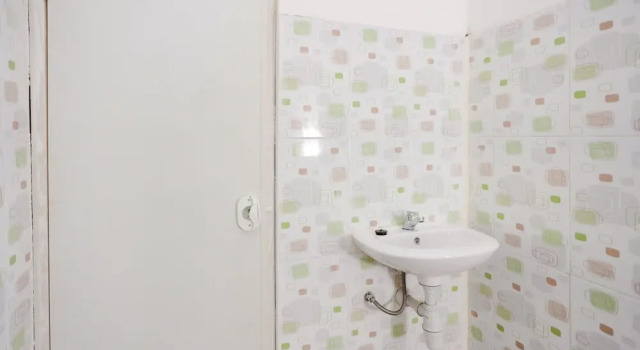 Habitación Estándar RedDoorz near Plaza Araya 2