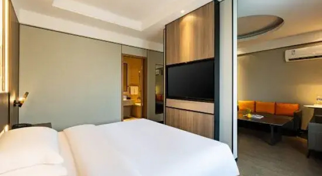 Люкс Business Qing Teng Yi Su Hotel (Ningbo Beilun Ning Vocational College Store)