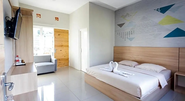 Camera Deluxe Villa Panderman Indah