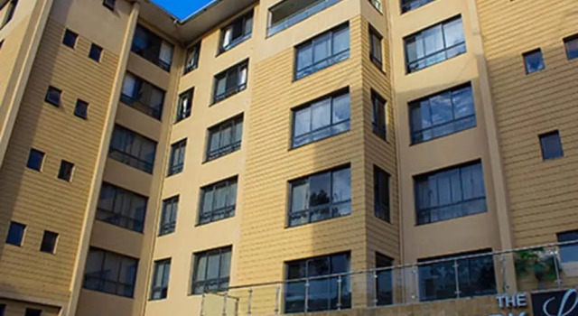 Stay at the Landmark Suites And Relax by the Pool And Enjoy the Amenities
