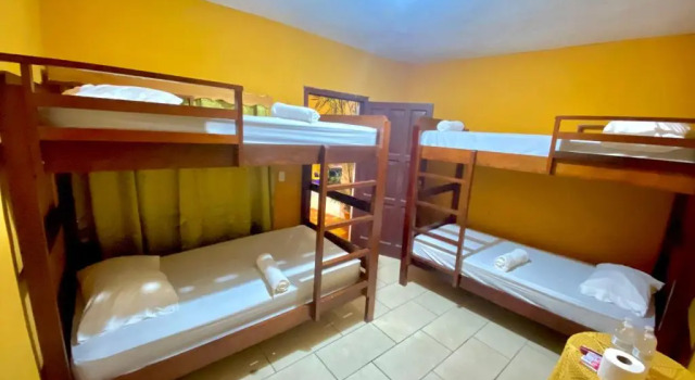 Кровать в общем номере Hotel San Miguel