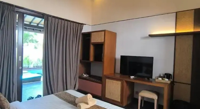 Семейная вилла с 4 комнатами The Trawangan Resort