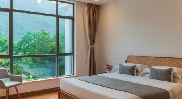 Двухместный люкс c 1 комнатой с балконом Yueshanyueshui Vacation Apartment (Yangshuo Yulong River Xiatang Wharf)