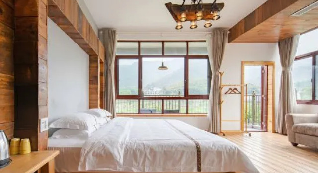 Кровать в общем номере That Week Holiday Inn (Moganshan Bran）