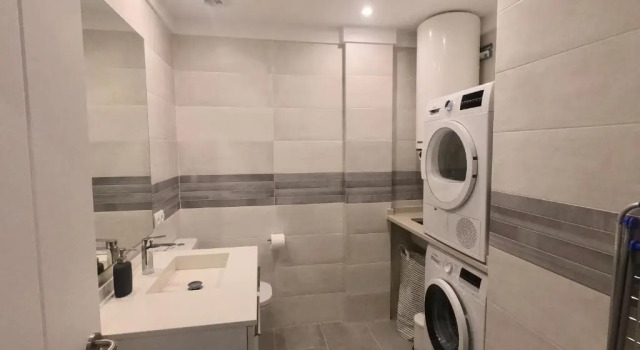Апартаменты Apartamento nuevo en el centro con garaje