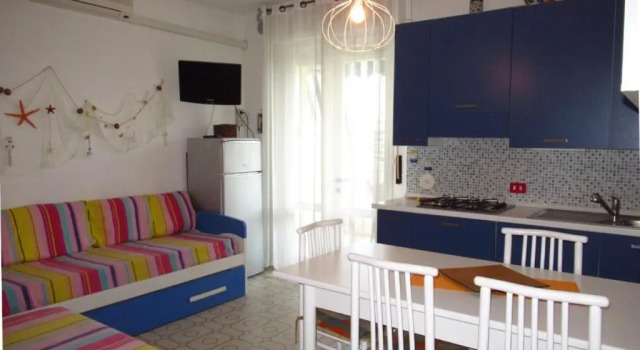 Colourful Studio With Shared Pool for 4 Guests, Забронировать Апартаменты/квартира Каорле Линьяно-Ривьера