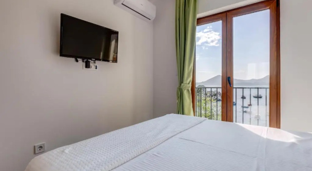Апартаменты с видом на море Mima Apartments
