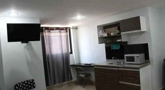 Номер Deluxe CAPITAL O Lowe Suites
