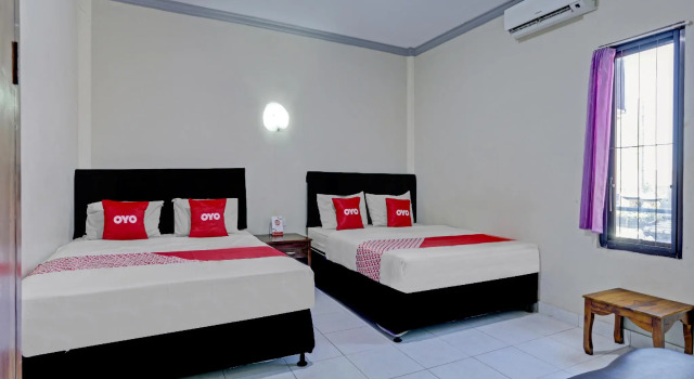 Семейный люкс OYO 90520 Kuta Family Guest House