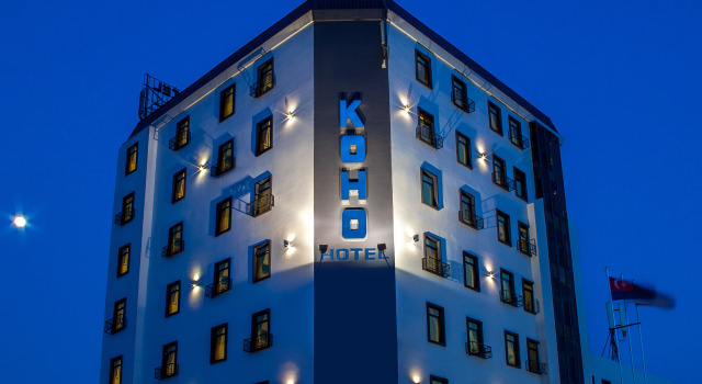 Кровать в общем номере Koho Hotel