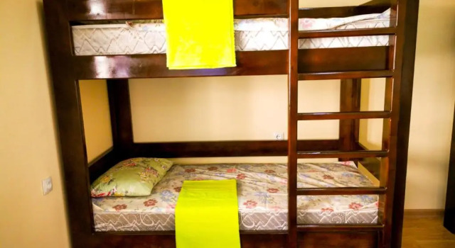 Кровать в общем номере Kurak Homestay