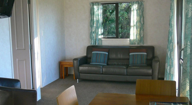 Oakura Beach Holiday Park, Buchen Sie Hotel Oakura 