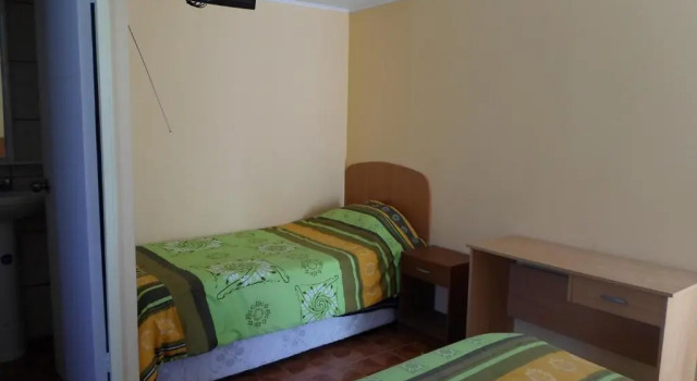Standard Quadruple room Hostal Playa Brava