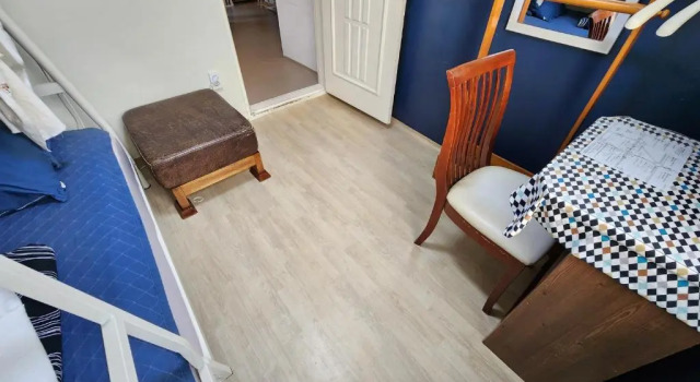 Cama en dormitorio compartido Aark House