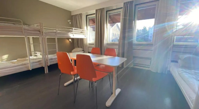 Кровать в общем номере Lidingo Arena Hotell