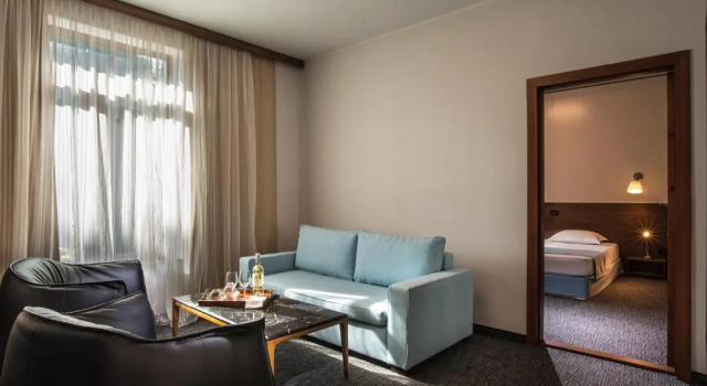 Апартаменты Uniqato Hotel