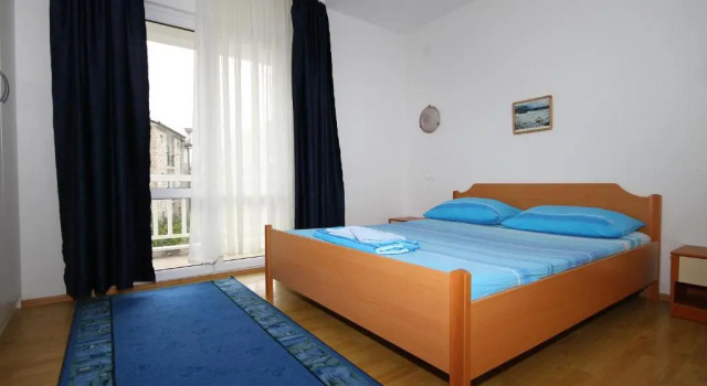 Апартаменты с 2 комнатами с балконом и с видом на море Apartments Lončar