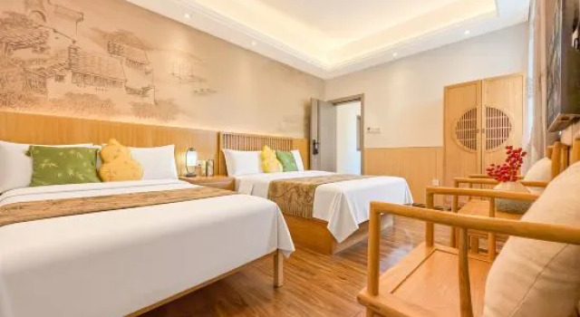 Кровать в общем номере Wushe Boutique Inn