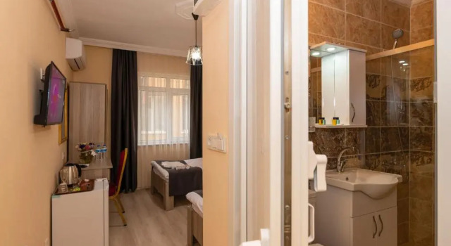 Standardowy czteroosobowy pokój Avrupa Palace Hotel