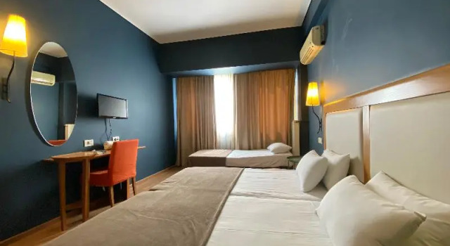 Трёхместный номер Standard с балконом Olympic Hotel
