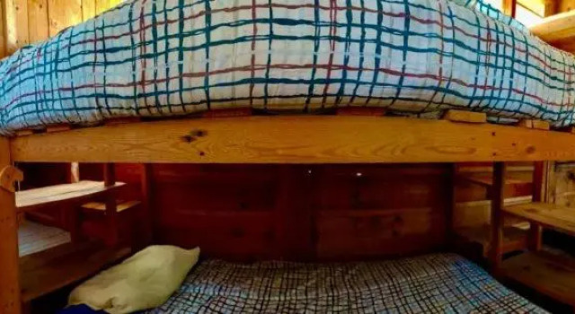 Кровать в общем номере Horus Santuario Holistico