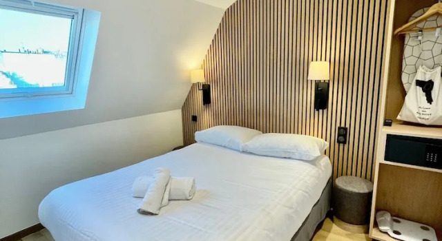 Четырёхместный семейный номер Standard HOTEL AU COEUR DES ARTS ET METIERS
