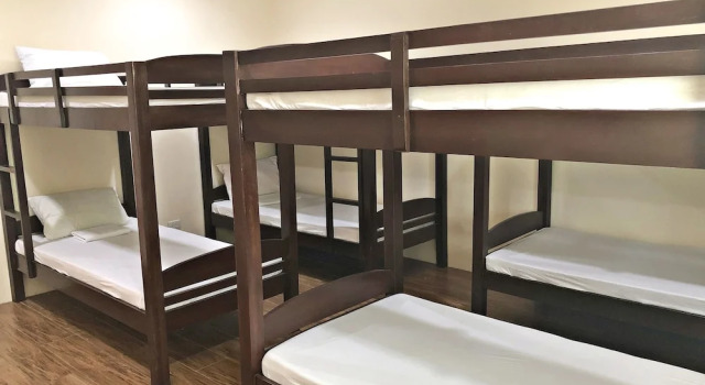 Кровать в общем номере Sea Garden Resort Iloilo