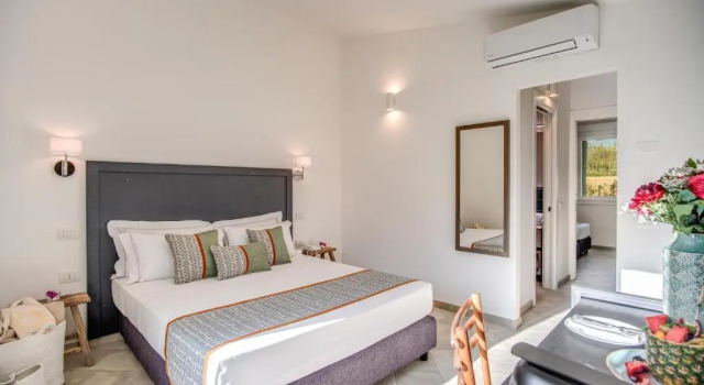Люкс с 2 комнатами Cala Sinzias Resort